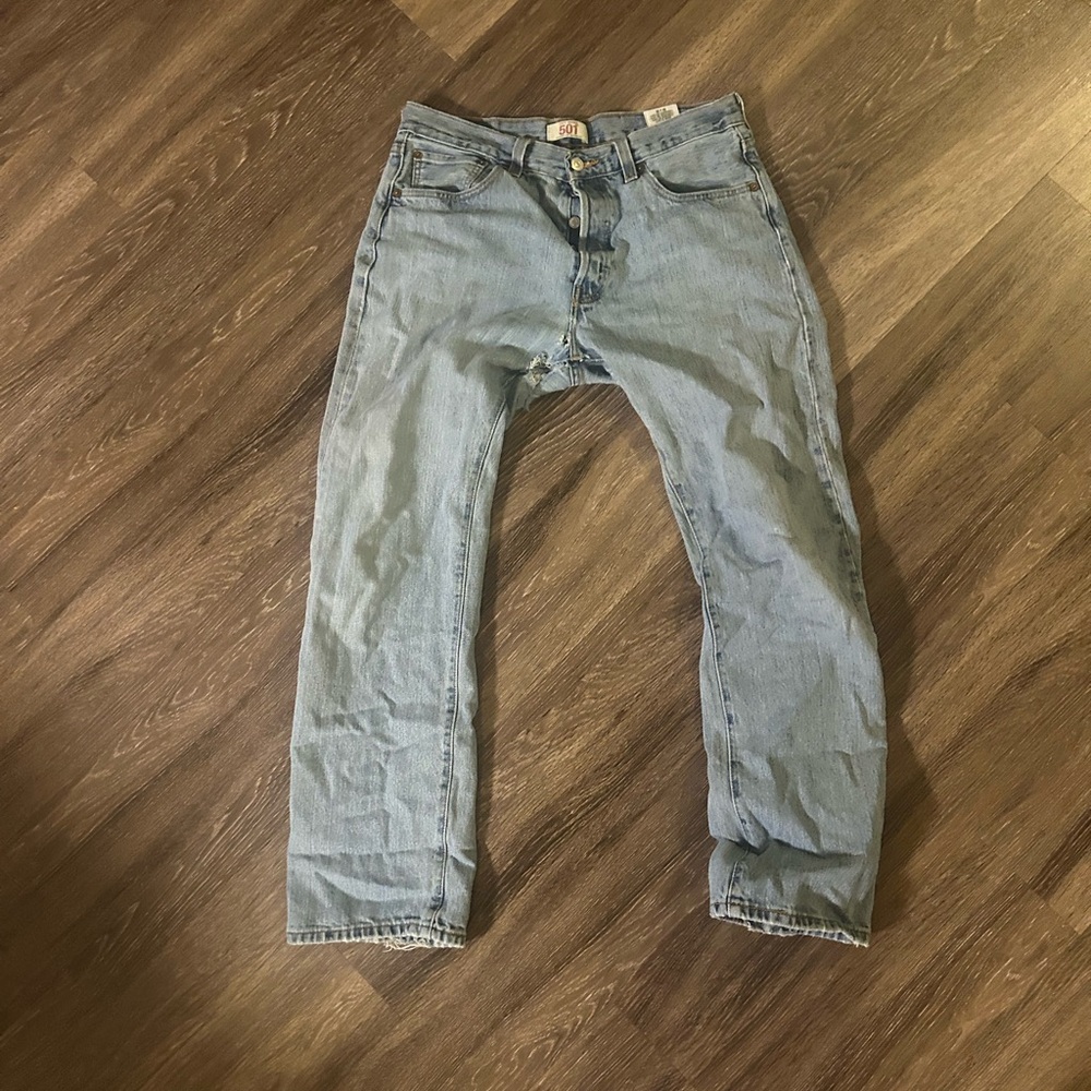Vintage Levi 501s size 28 with cut in butt